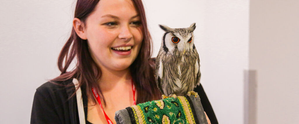 Student Holding Owl