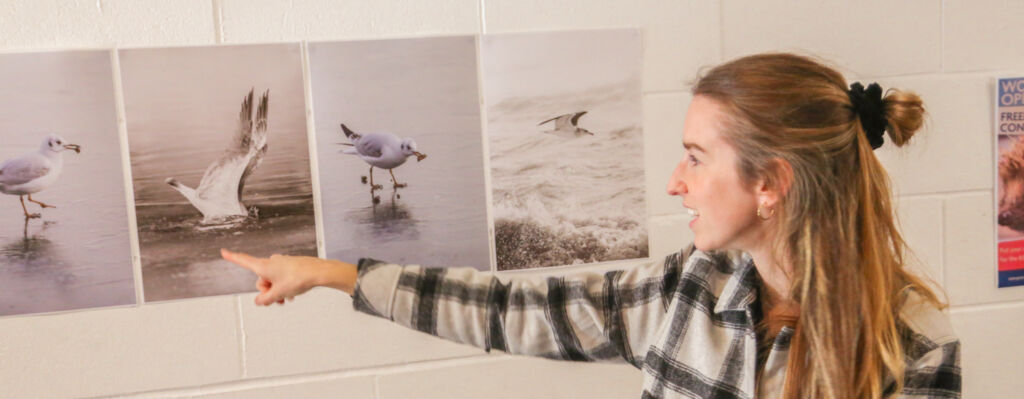 Student Looking At Photos